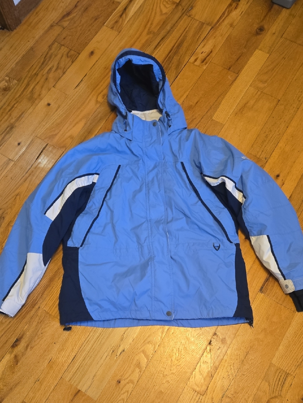 Light Blue Hooded Women's Ski Jacket with Navy & White Accents